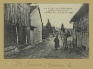 SOMME-BIONNE. -1174-La grande Guerre 1914-16. Somme-Bionne (Marne). La route d'Auve à la sortie du village.
(75 - Parisimp. Baudinière).[vers 1916]