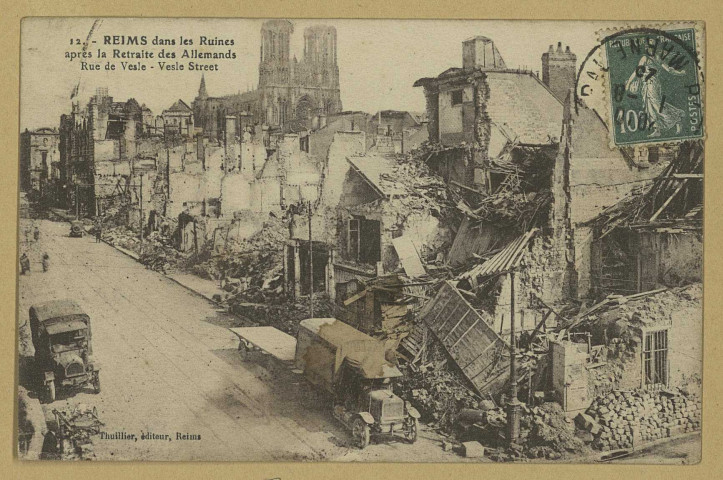 REIMS. 12. Reims dans les Ruines après la Retraite des Allemands - Rue de Vesle - Vesle Street.